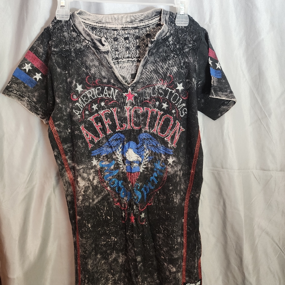 Black, dark grey, red and some blue affliction shirt